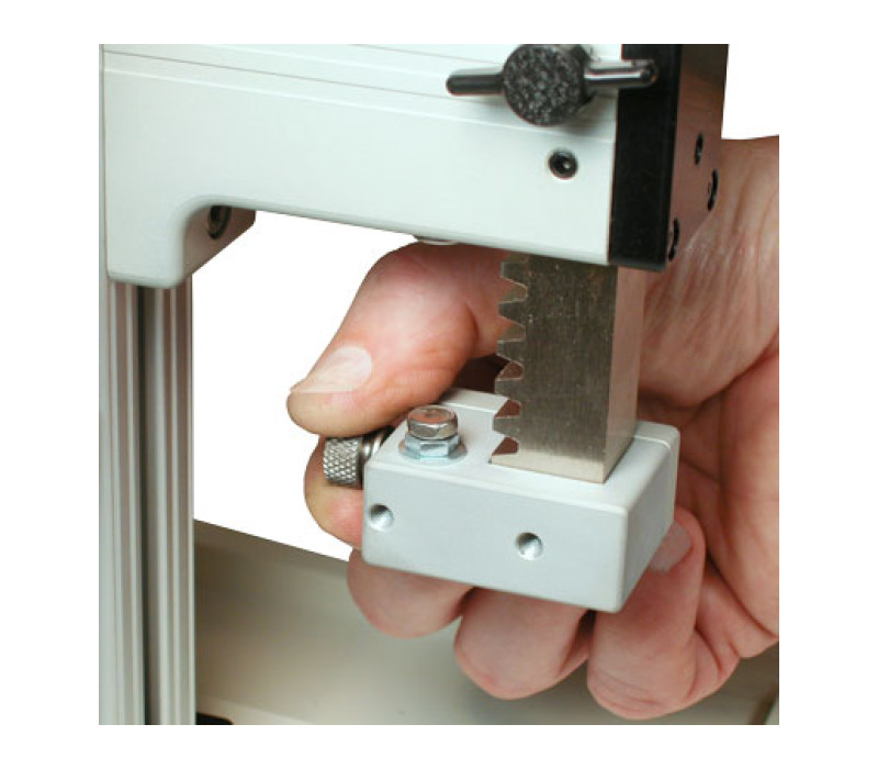 Adjustable upper and lower travel stops are useful for repetitive test requirements.