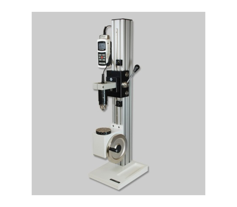 The TST vertical manual torque test stand is shown with a Model 5I force/torque indicator and Series R50 torque sensor.