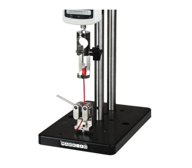 G1002 shown in a typical wire terminal pull testing application, used in conjunction with a digital force gauge, test stand, and G1001 wire terminal grip.