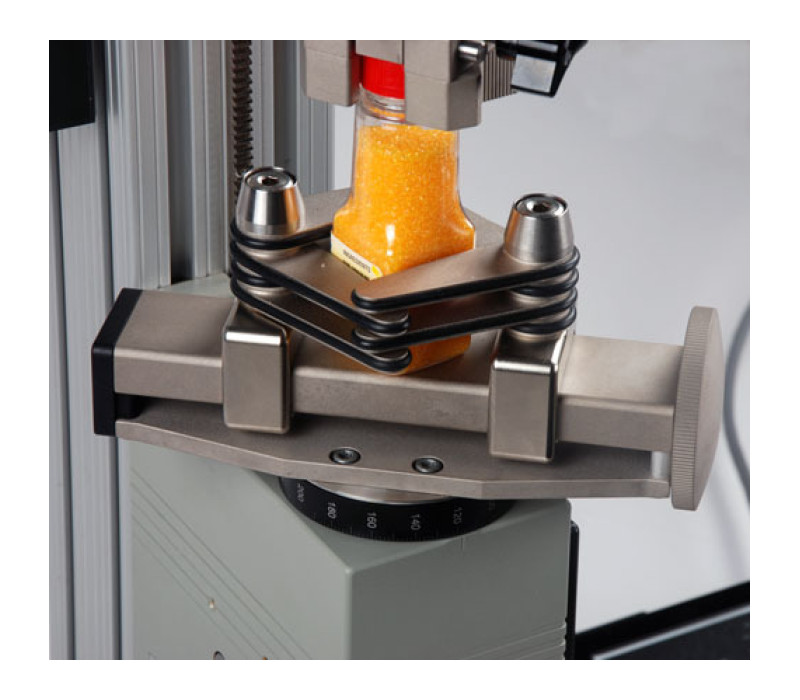 G1023 shown mounted to a torque test stand in a bottle cap torque testing application.