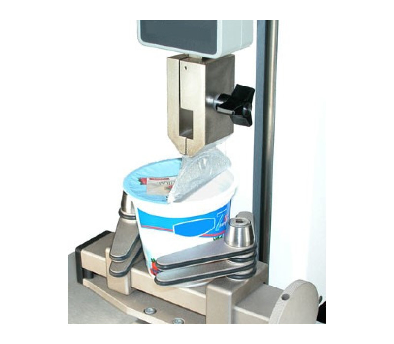 G1023 is shown in a foil seal peel application, mounted to a G1109 90° peel fixture, with AC1080 adapter.