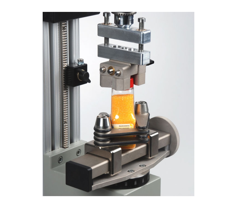 G1053 in combination with an AC1029 axial compensator used in a bottle cap torque test