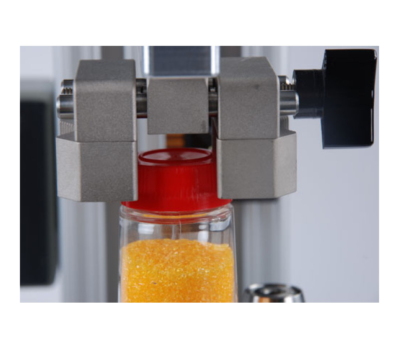 Serrated, reversible aluminum jaws effectively grip a wide range of sample shapes and sizes