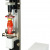 CAP-TSTM, The CAP-TSTM-DC motorized torque test setup, shown in a typical bottle cap torque testing application with M5I force/torque indicator, Series R50 torque sensor, G1023 and G1058 grips.