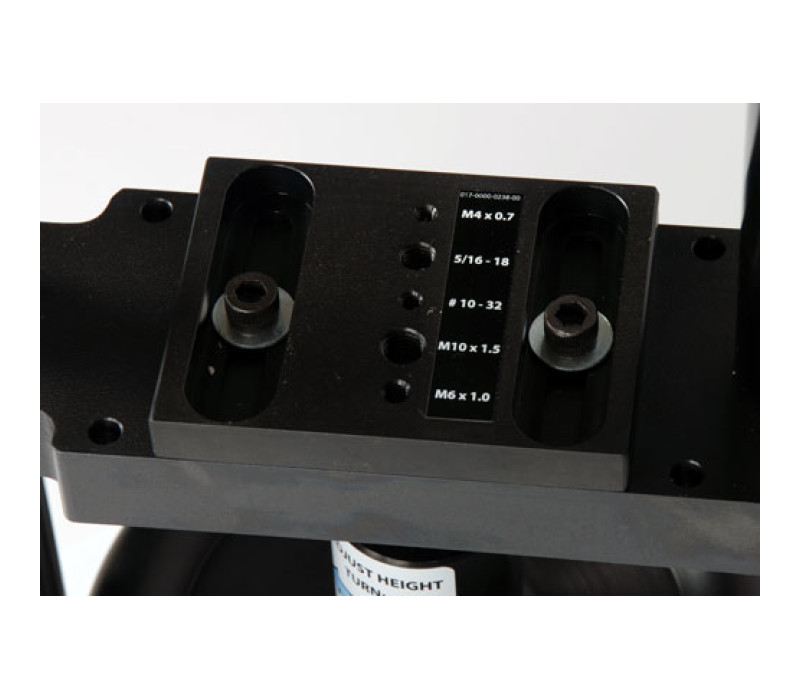 Ground plate with different threaded holes to mount a variation of bottom fixtures