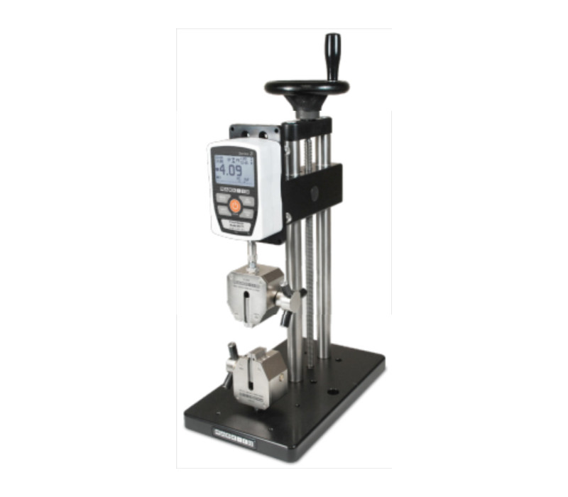 Series-3 Force Gauge mounted to an ES20 manual test stand in a setup with G1061 Wedge Grips