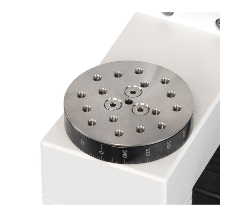 Rotating mounting plate of a TST(M) test stand contains a matrix of threaded holes for mounting the G1022 Jacobs chuck grip