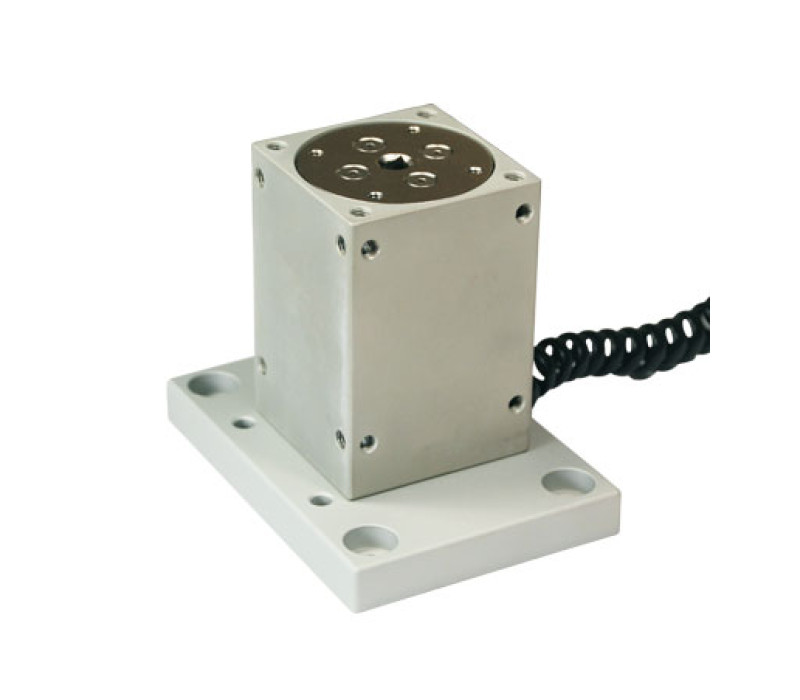 Series R52 torque sensors include threaded holes on all surfaces for flexibility in a variety of mounting configurations. Shown with the optional AC1006 tabletop mounting kit. 
