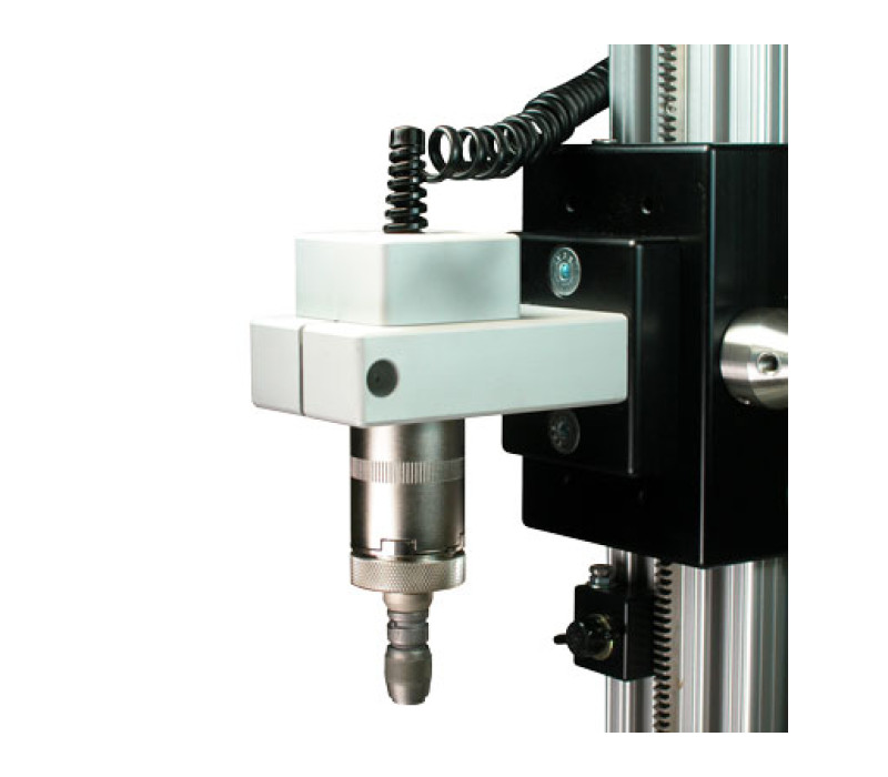 Here an optional mounting kit adapts the sensor to a model TST manual torque test stand.