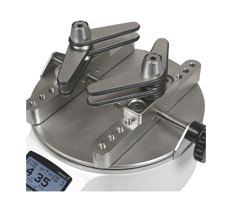 CT003, Optional adjustable jaws consist of 4 rubber-edged gripping arms per jaw. Arms may be independently repositioned in 45° increments to accommodate unique samples.