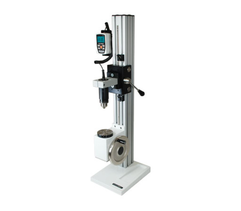 TT03 torque gauge is shown mounted to a TST manual torque test stand.