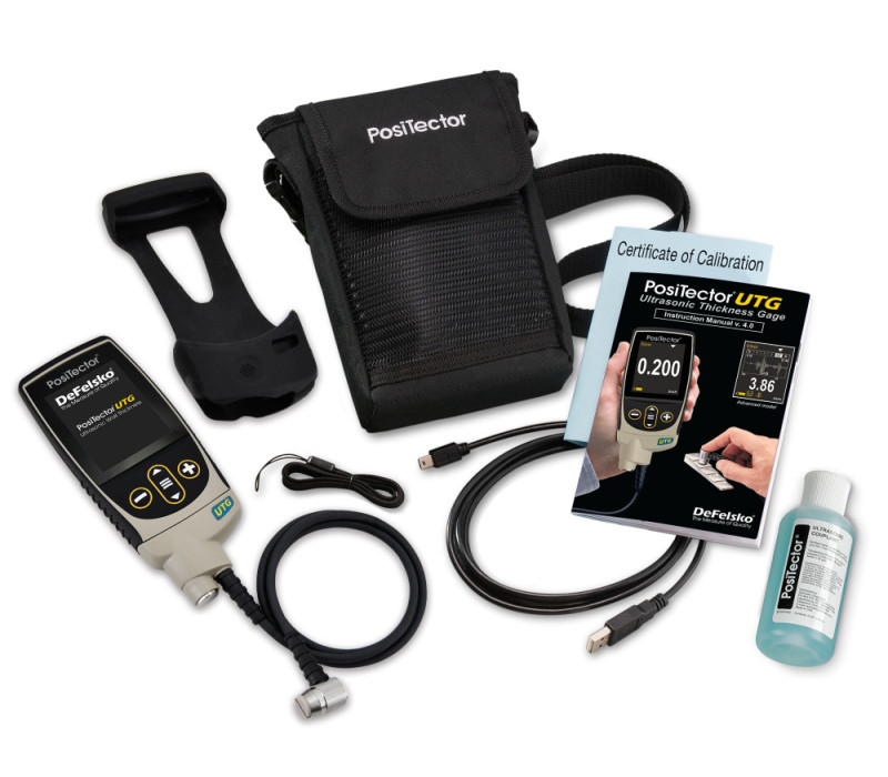 The PosiTector UTG comes complete with body and probe, couplant, rubber holster with belt clip, wrist strap, 3 AAA batteries, instructions, nylon carrying case with shoulder strap, protective lens shield, Certificate of Calibration, USB Cable and software