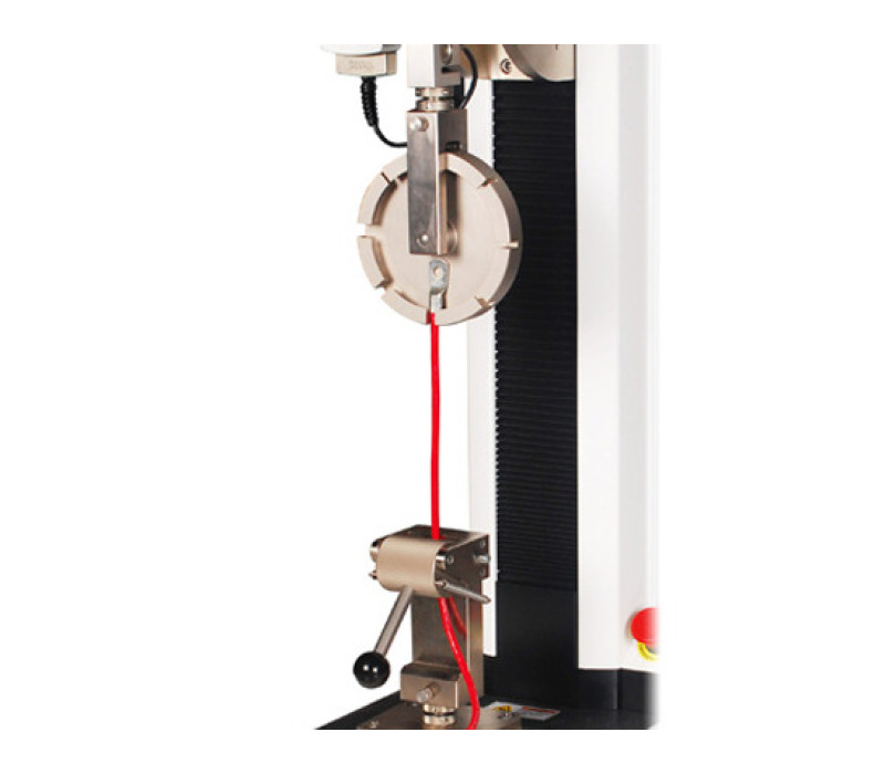 G1094 grip combinate with a G1093 wire terminal grip in a typical terminal pull test, mounted to an ESM1500LC motorized test stand.