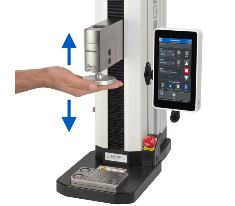 An F305-EM Test Stand performing a tensile test with two G1061 Wedge Grips.