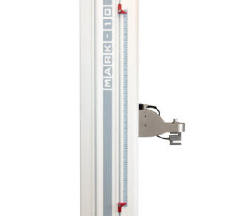 Solid-state upper and lower limit switches may be used as test limits or to prevent over-travel. An inch-mm ruler aids in switch placement.