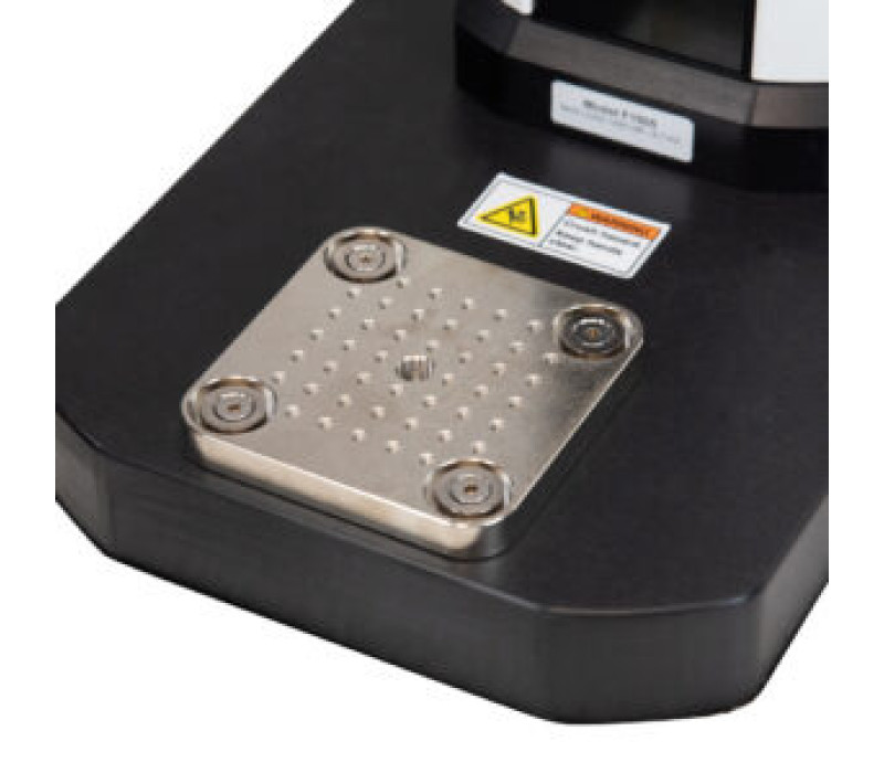 Base plate includes a matrix of threaded holes. Floating washers allow for precise x-y positoning.