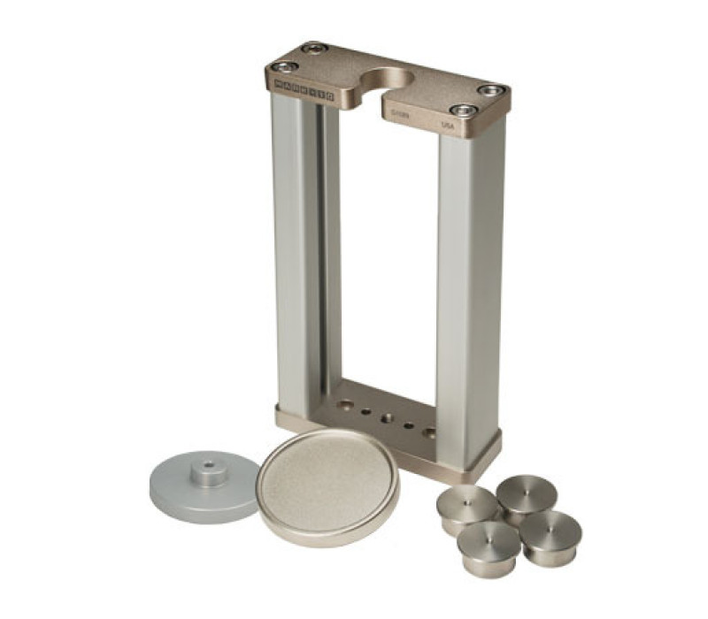 G1089 includes four blank drillable stainless steel inserts with pilot holes, cup tray, 2 in. (51 mm) diameter compression plate, and hardware for test stand mounting.