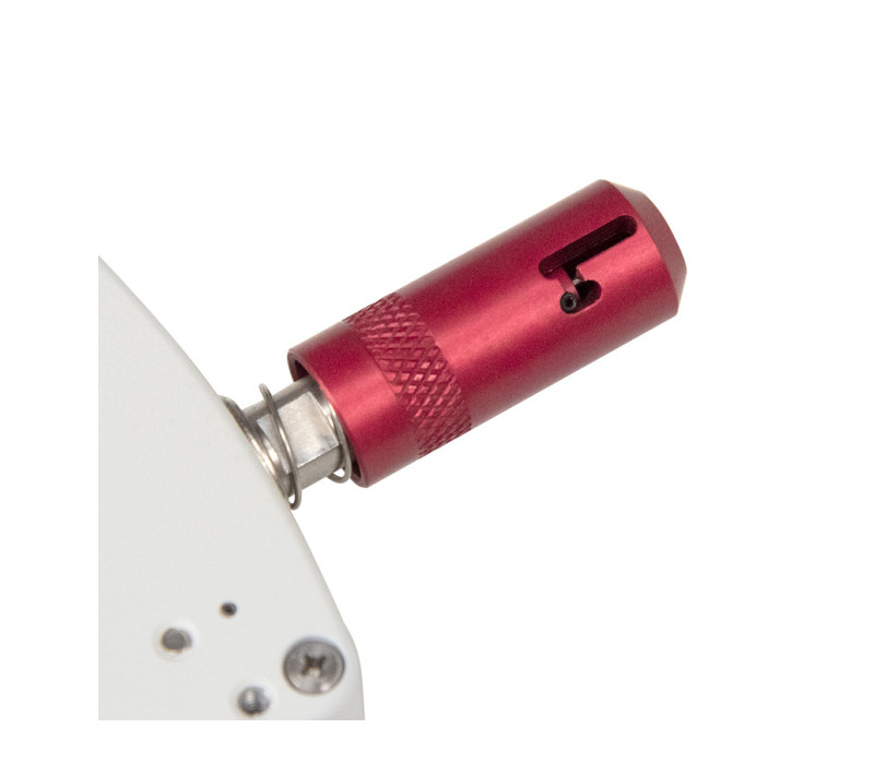 A safety slot prevents the needle from protruding when not in use, even while pushing on the fixture.